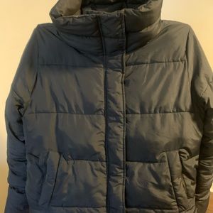 Black winter Abercrombie coat with writing on the arms